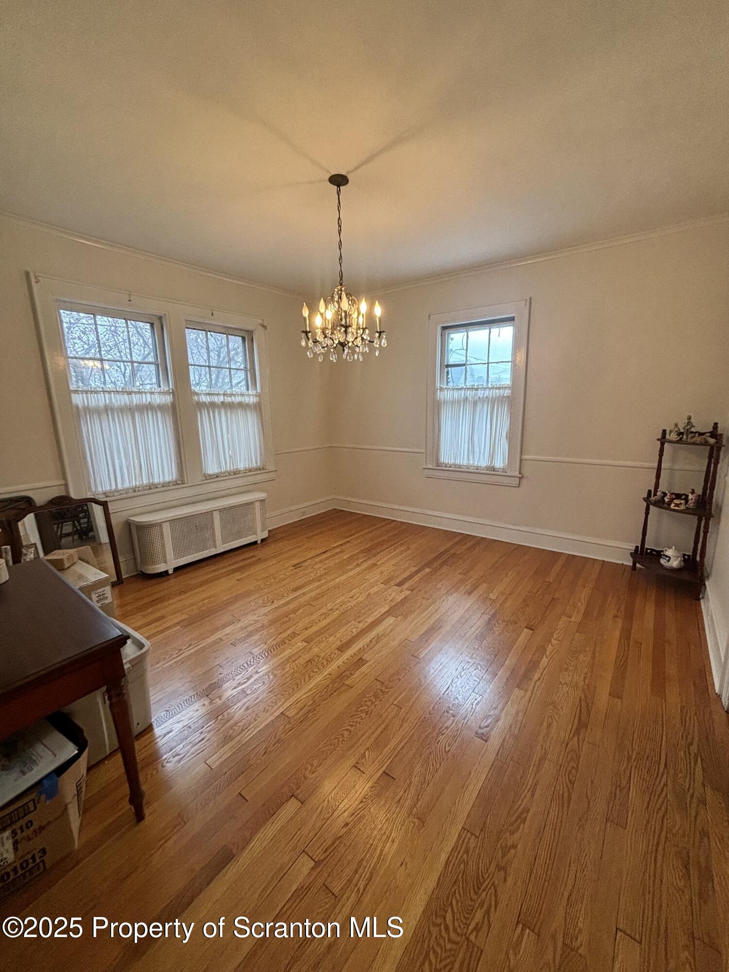 1625 Clay Avenue Dunmore, PA 18509 - Photo 5 of 17 a view of a room with wooden floor and windows