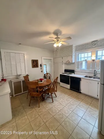 a view of a dining room kitchen and a sink