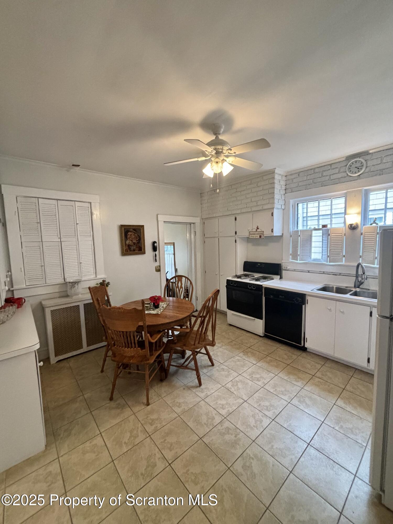 1625 Clay Avenue Dunmore, PA 18509 - Photo 7 of 17 a view of a dining room kitchen and a sink
