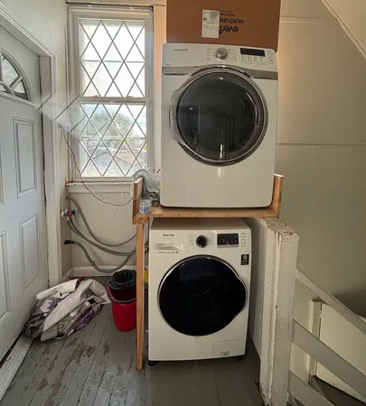 a utility room with dryer and washer