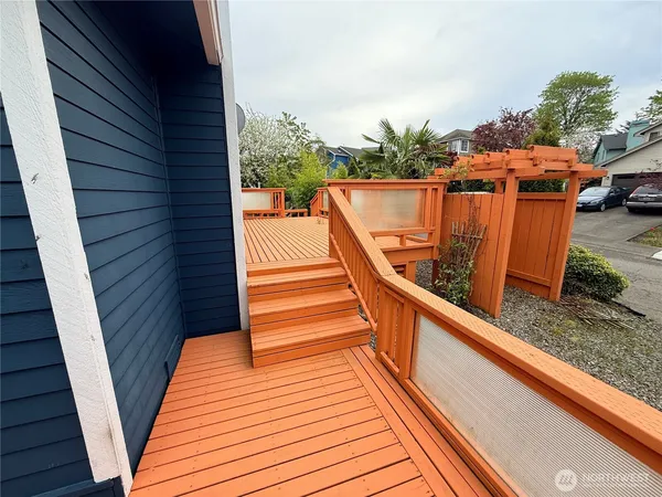 a view of balcony with furniture