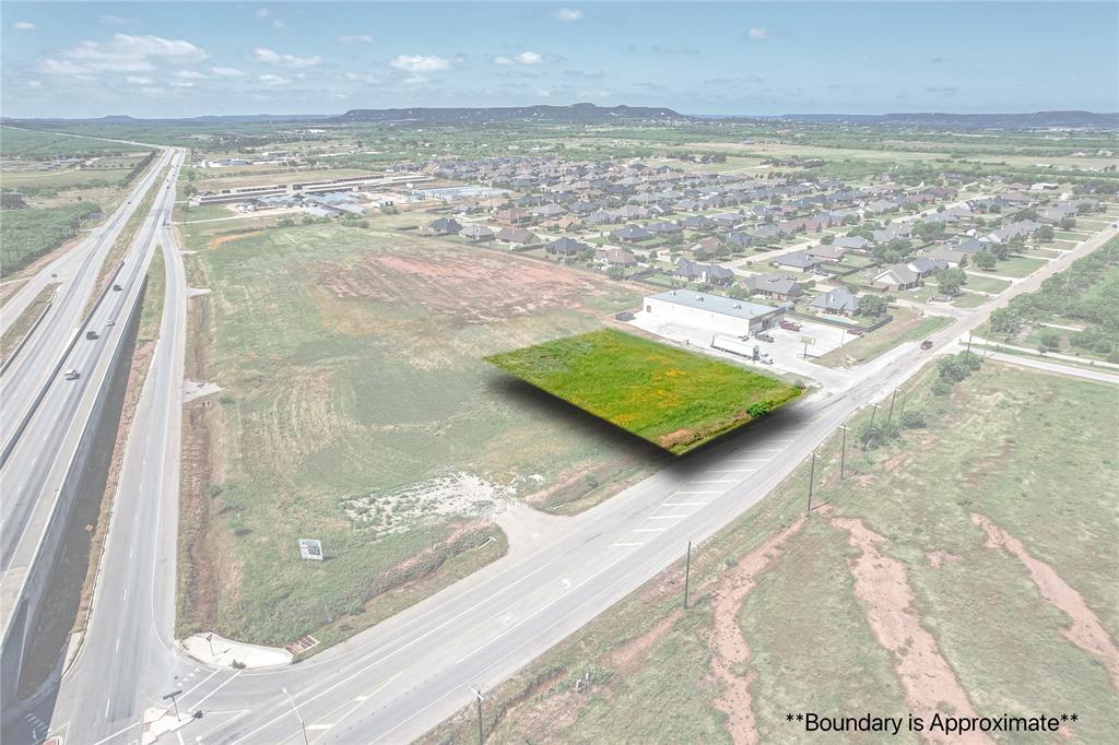 1± Acre available neighboring major anchor store and prime highway access location!