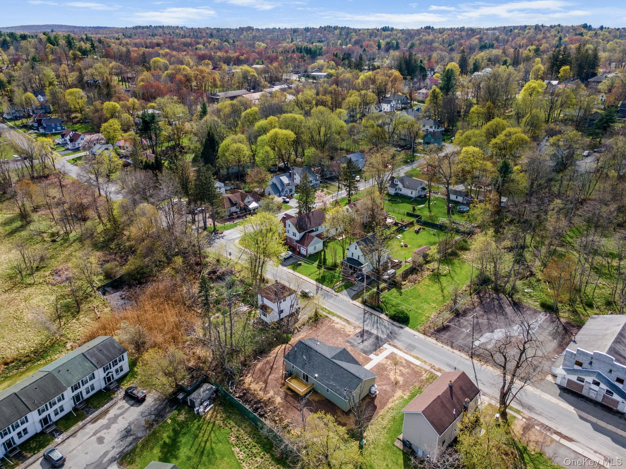 23 Spring Street Monticello, NY 12701 - Photo 43 of 44 an aerial view of residential house with outdoor space