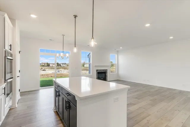 a kitchen with a sink and stove