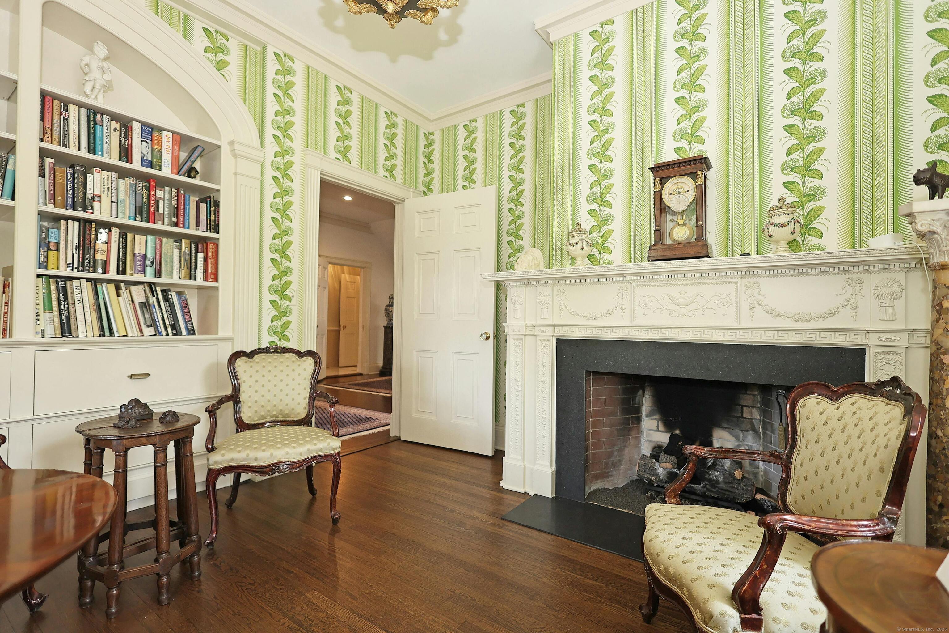 27 Country Club Road Ridgefield, CT 06877 - Photo 16 of 40 a living room with furniture and a fireplace