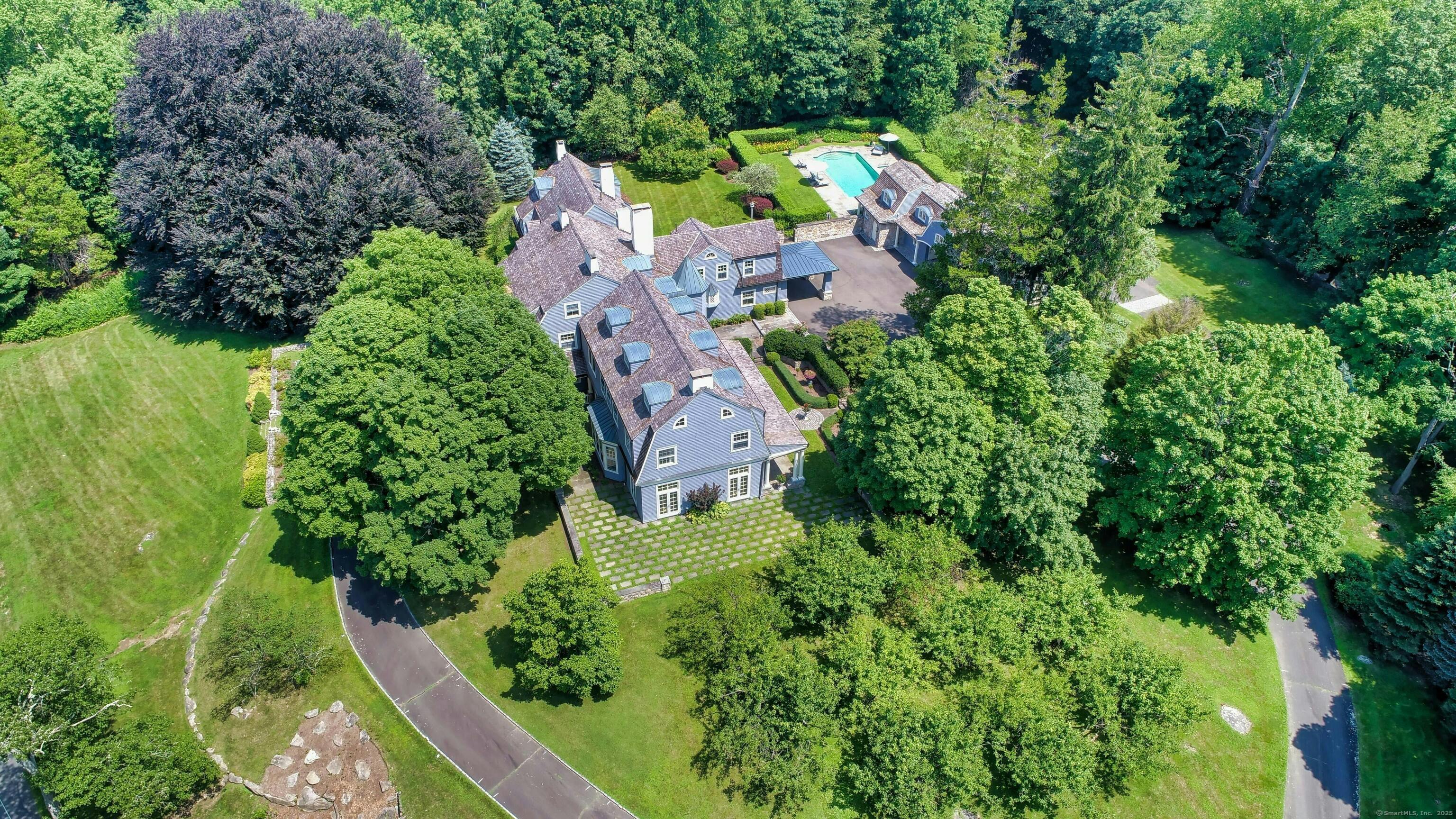 27 Country Club Road Ridgefield, CT 06877 - Photo 2 of 40 an aerial view of residential house with outdoor space and trees all around