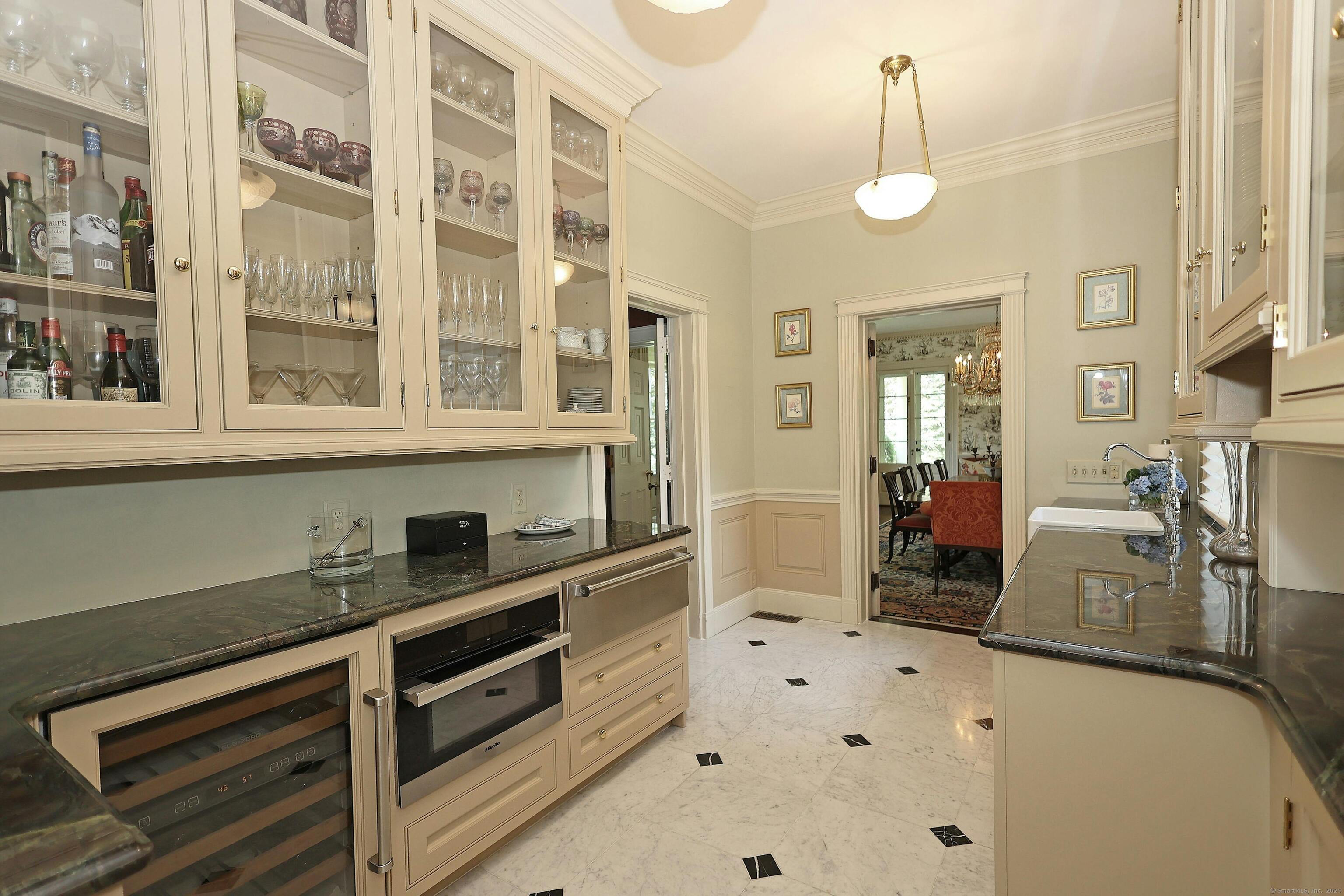 27 Country Club Road Ridgefield, CT 06877 - Photo 21 of 40 a kitchen with granite countertop a sink and a stove