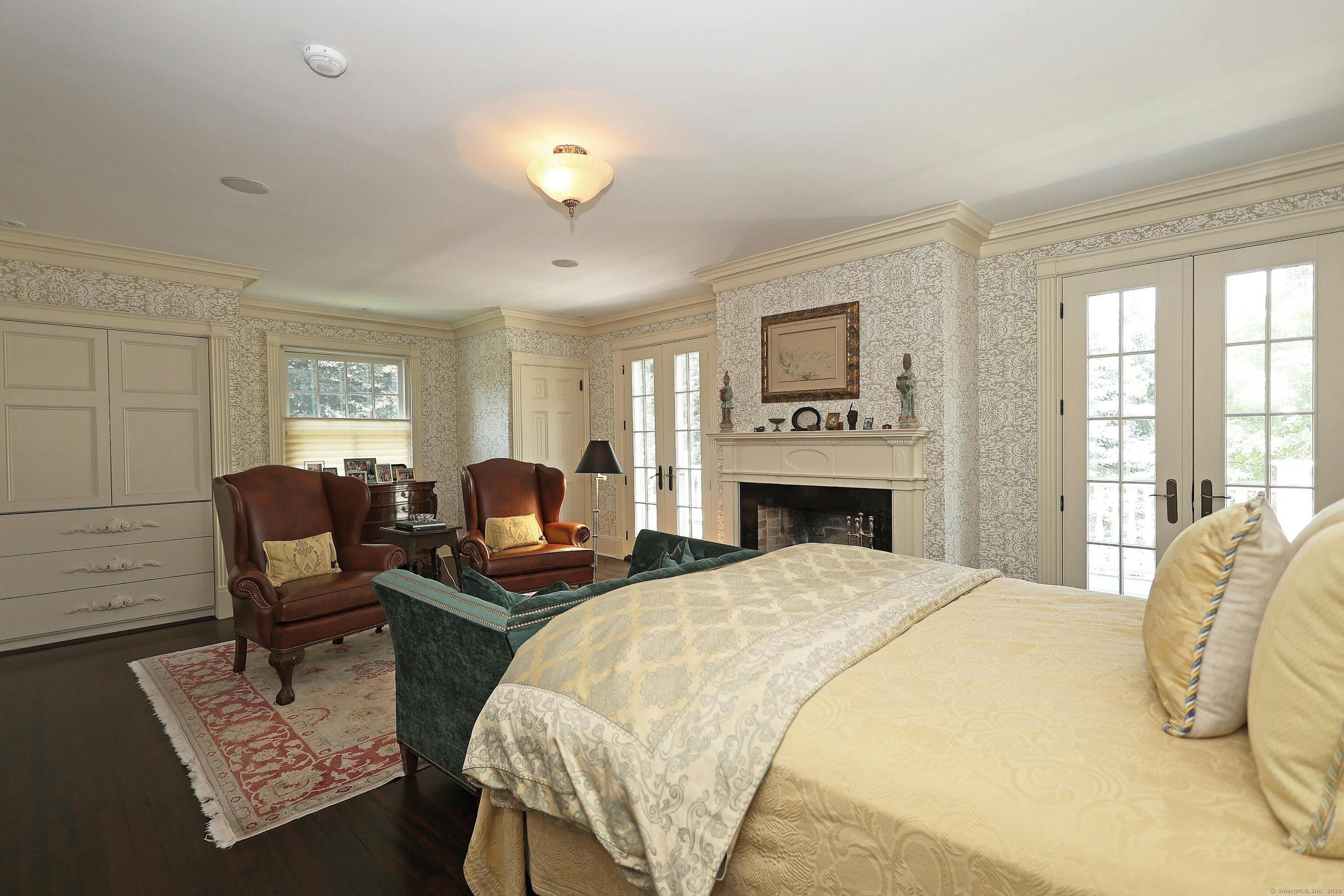 27 Country Club Road Ridgefield, CT 06877 - Photo 26 of 40 a bedroom with a bed and furniture