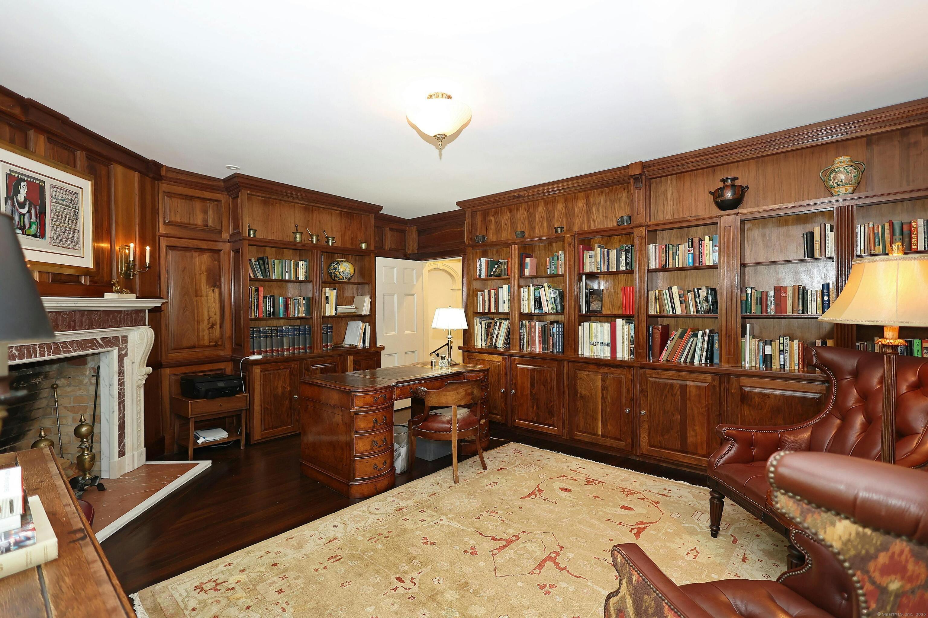 27 Country Club Road Ridgefield, CT 06877 - Photo 31 of 40 a bed room with furniture and a flat screen tv