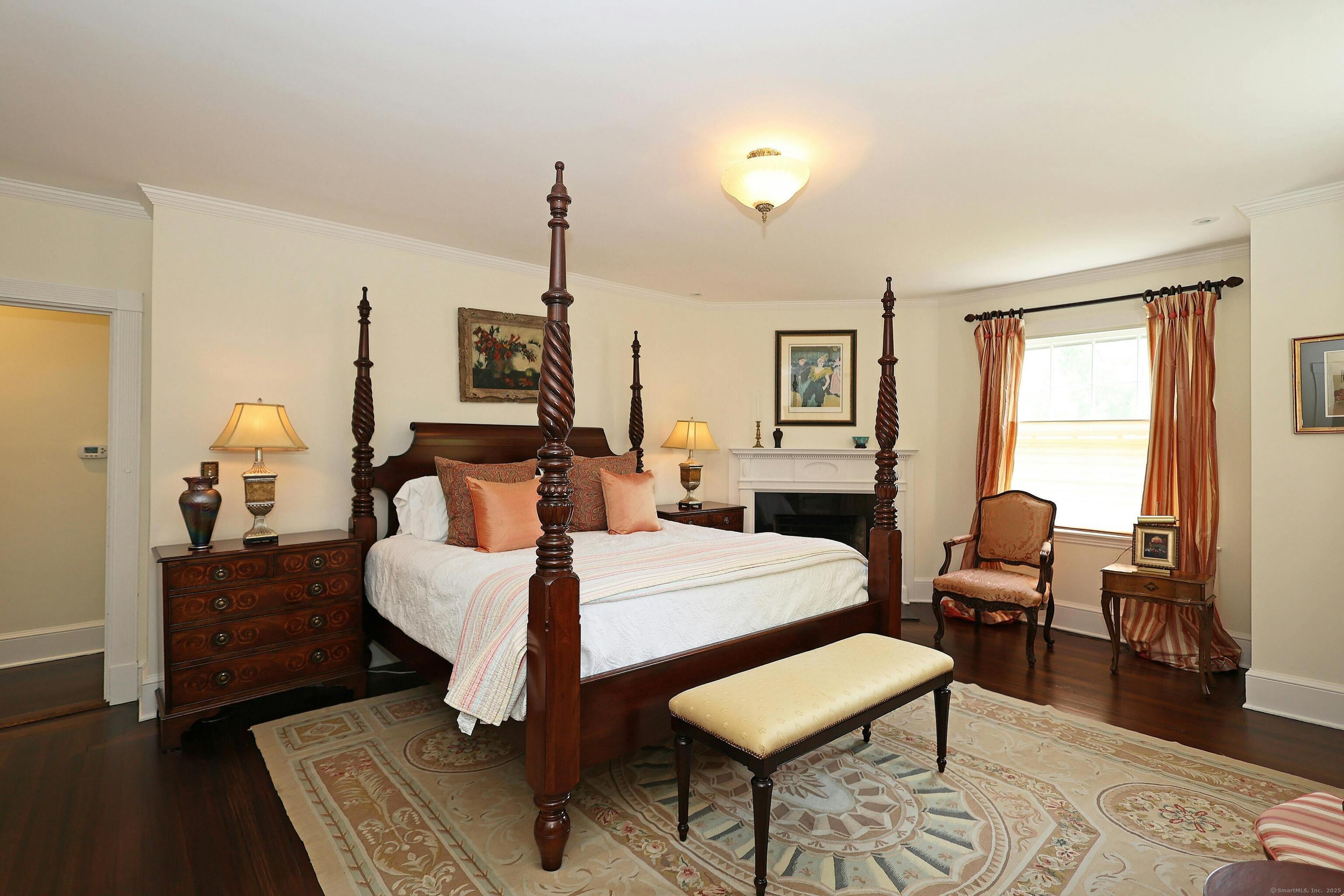 27 Country Club Road Ridgefield, CT 06877 - Photo 32 of 40 a bedroom with furniture and wooden floor