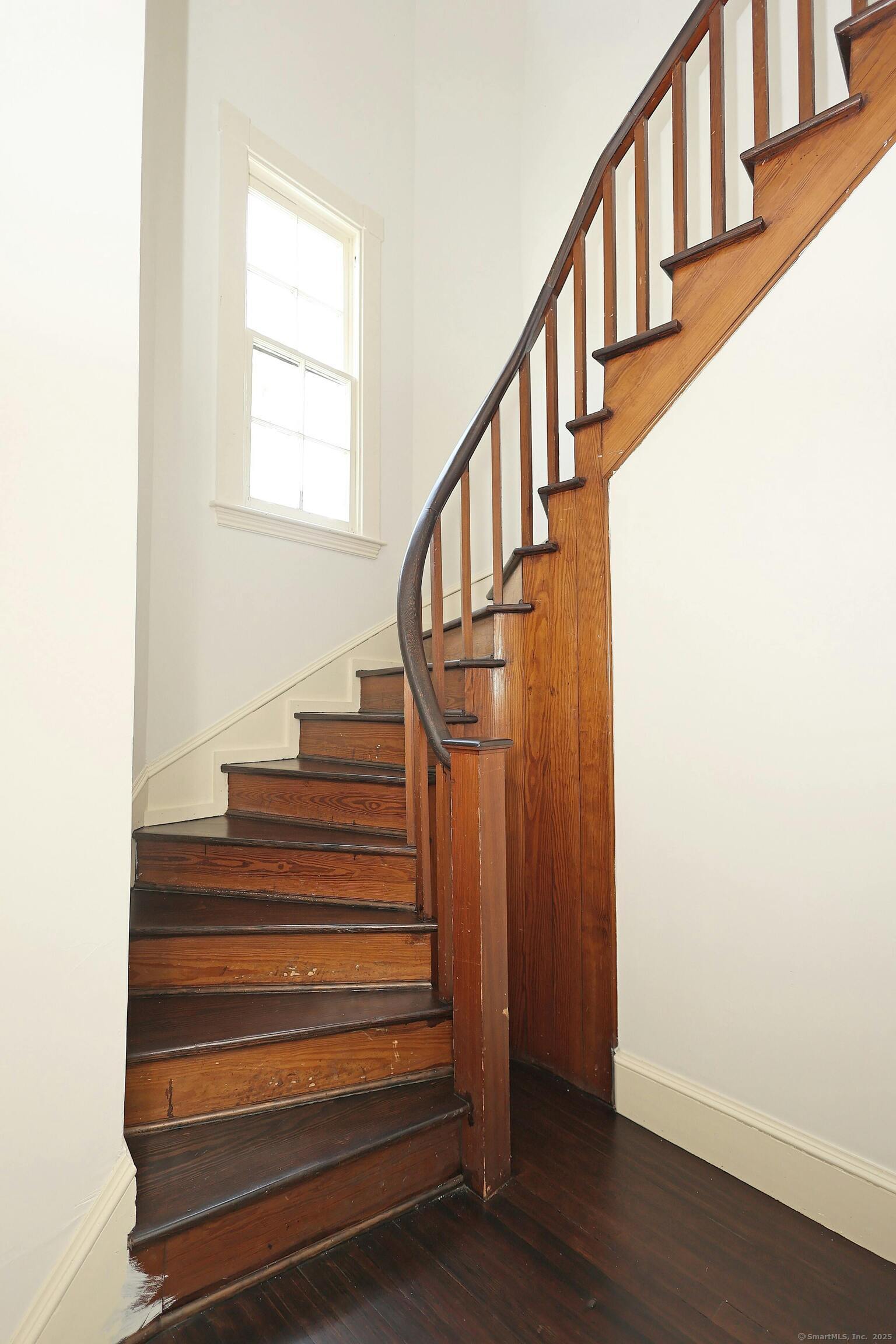 27 Country Club Road Ridgefield, CT 06877 - Photo 36 of 40 a view of entryway with wooden floor and stairs