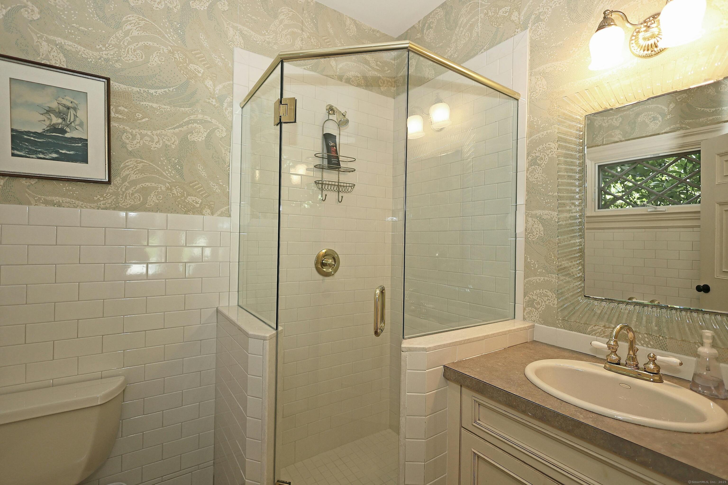 27 Country Club Road Ridgefield, CT 06877 - Photo 39 of 40 a bathroom with a sink toilet and shower