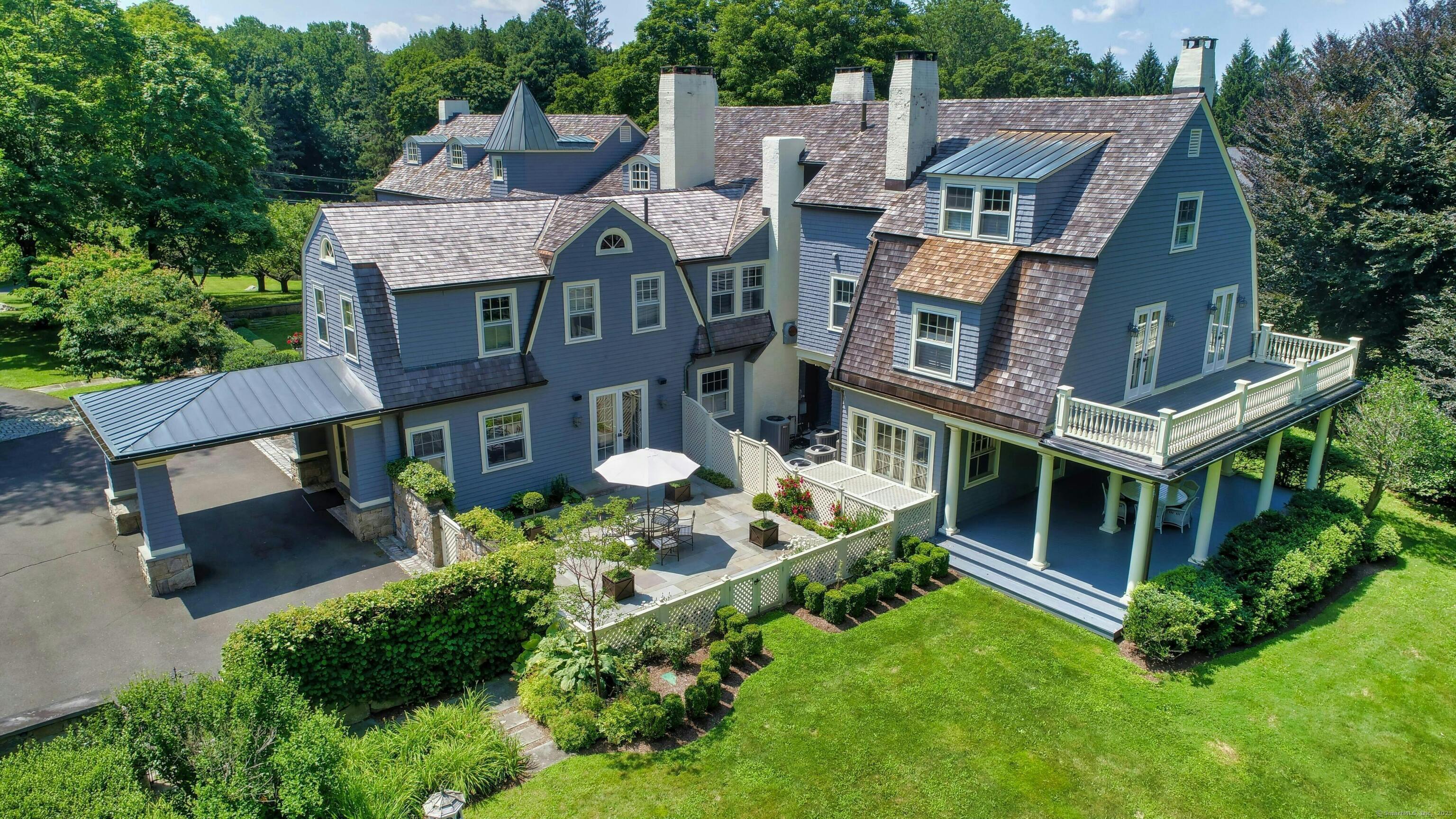 27 Country Club Road Ridgefield, CT 06877 - Photo 5 of 40 an aerial view of a house with a garden