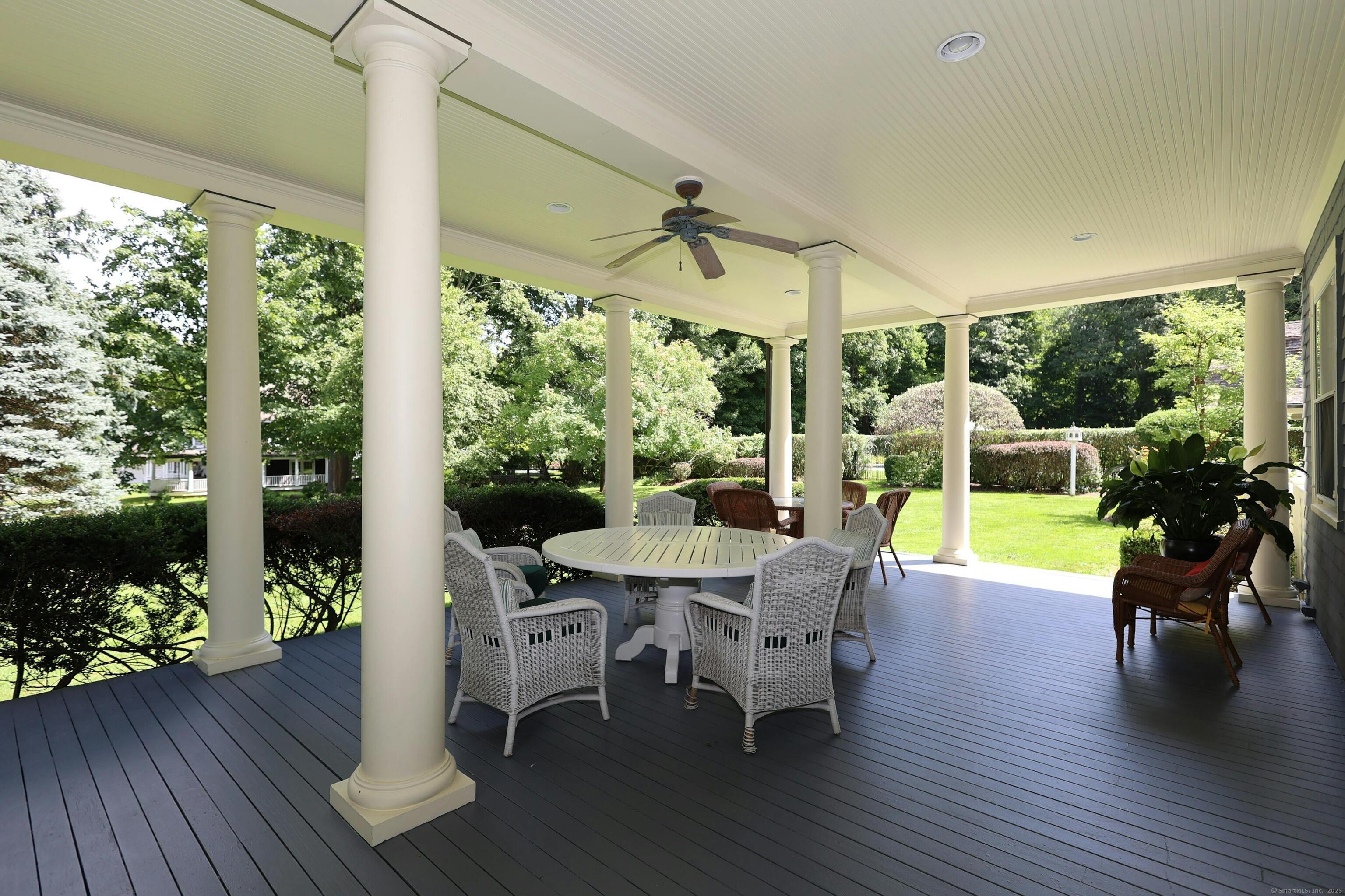 27 Country Club Road Ridgefield, CT 06877 - Photo 10 of 40 a view of a dining room with furniture window and wooden floor