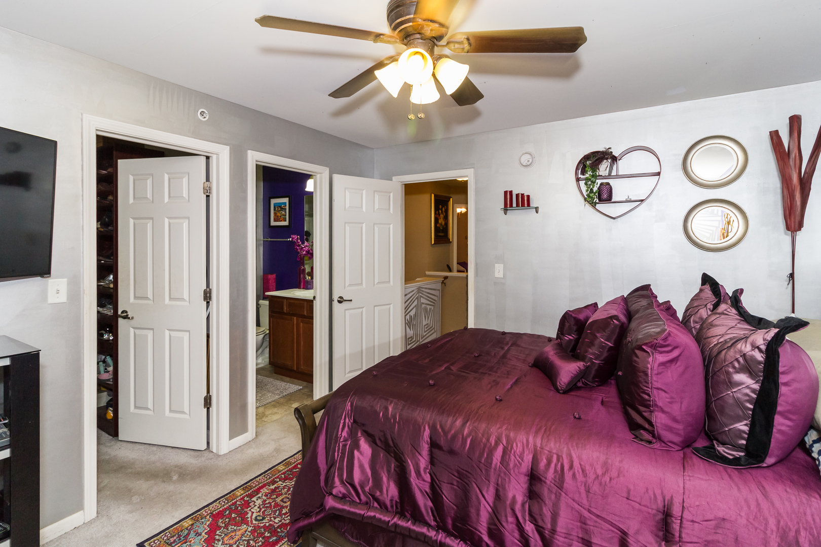 10344 Kerry Ridge Court Chicago Ridge, IL 60415 - Photo 22 of 27 a bedroom with a bed and a chandelier