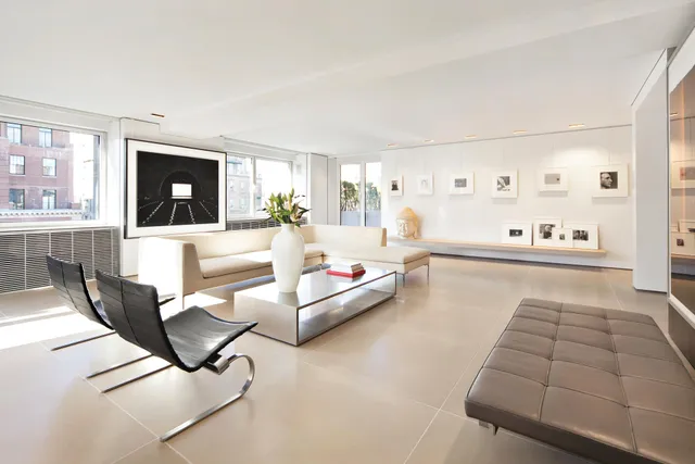 a living room with furniture and window