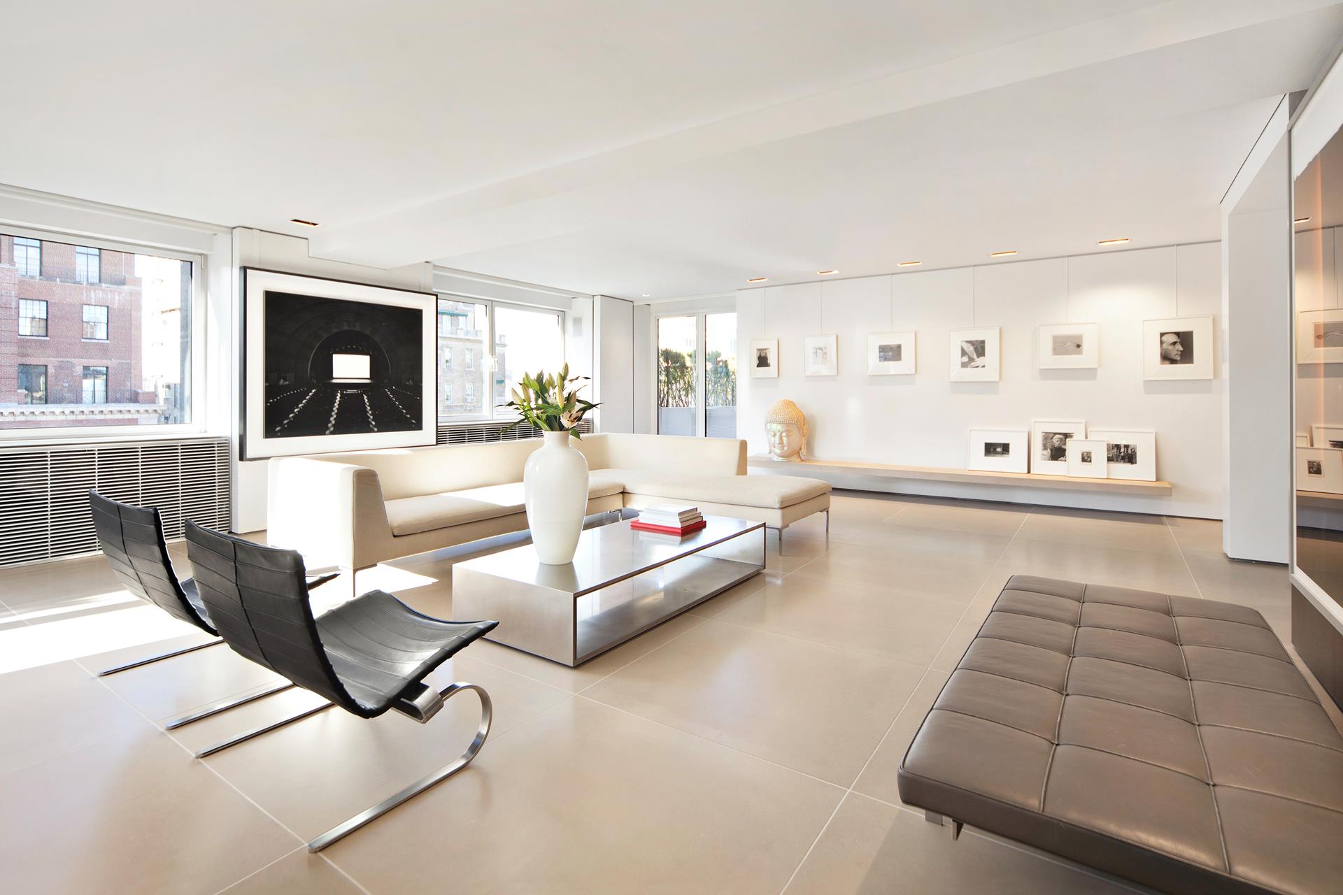 a living room with furniture and window