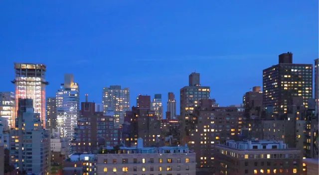 a picture of a couch in front of a building