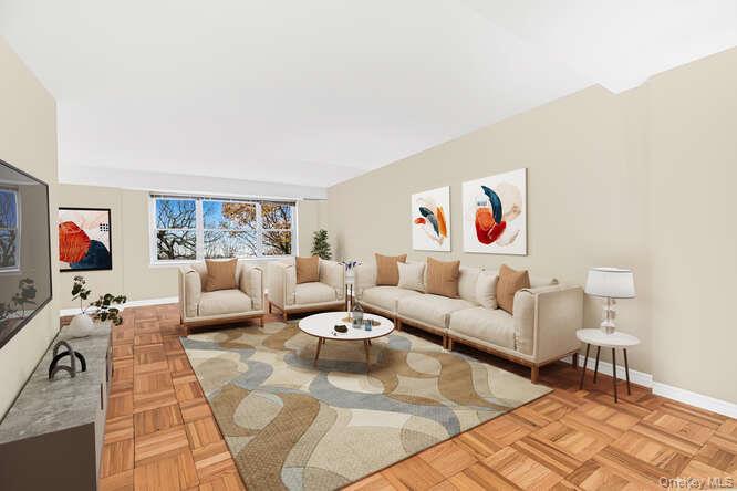 235 Garth Road, Unit E5I Scarsdale, NY 10583 - Photo 7 of 22 a living room with furniture and a rug