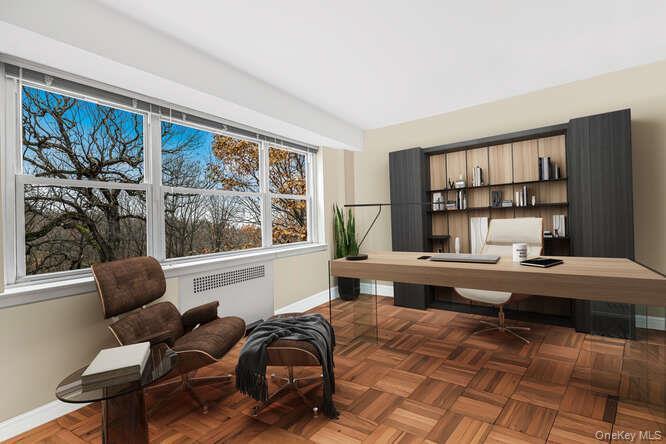 235 Garth Road, Unit E5I Scarsdale, NY 10583 - Photo 8 of 22 a room with furniture and a window