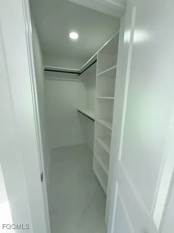 en empty room with windows