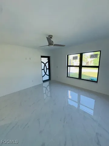 a kitchen with cabinets and white appliances