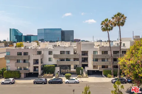 a front view of a building with street view