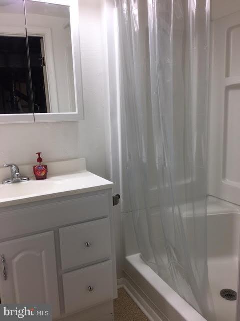 28 South Ritters Lane Owings Mills, MD 21117 - Photo 11 of 30 a bathroom with a sink and shower