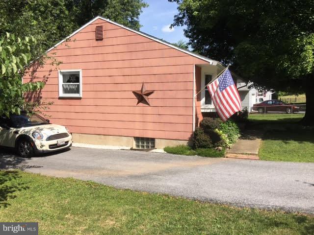 28 South Ritters Lane Owings Mills, MD 21117 - Photo 15 of 30 a view of a house with a yard