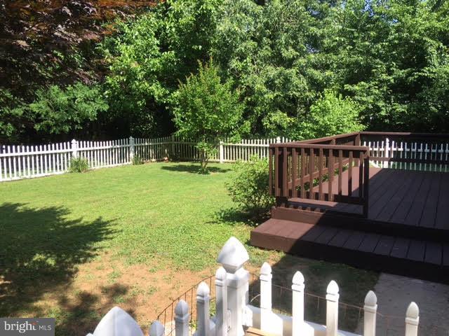 28 South Ritters Lane Owings Mills, MD 21117 - Photo 17 of 30 a view of a deck with a chair