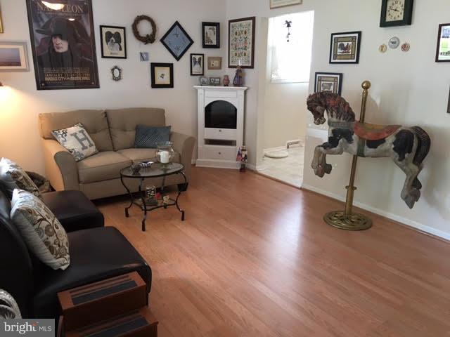 28 South Ritters Lane Owings Mills, MD 21117 - Photo 3 of 30 a living room with furniture and wooden floor