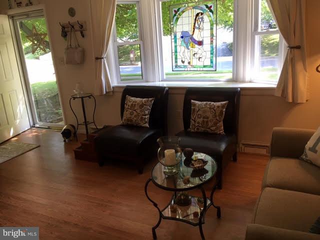 28 South Ritters Lane Owings Mills, MD 21117 - Photo 4 of 30 a living room with furniture and a large window