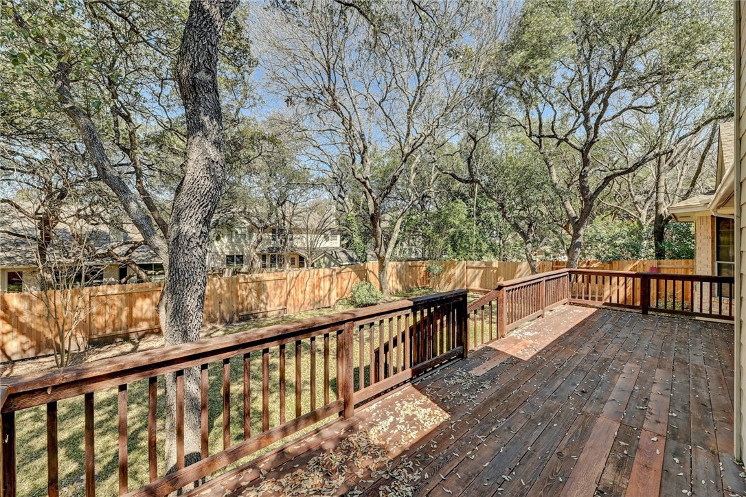 9404 Temecula Pass Austin, TX 78717 - Photo 24 of 31 Large deck and shaded back yard with tall mature trees!