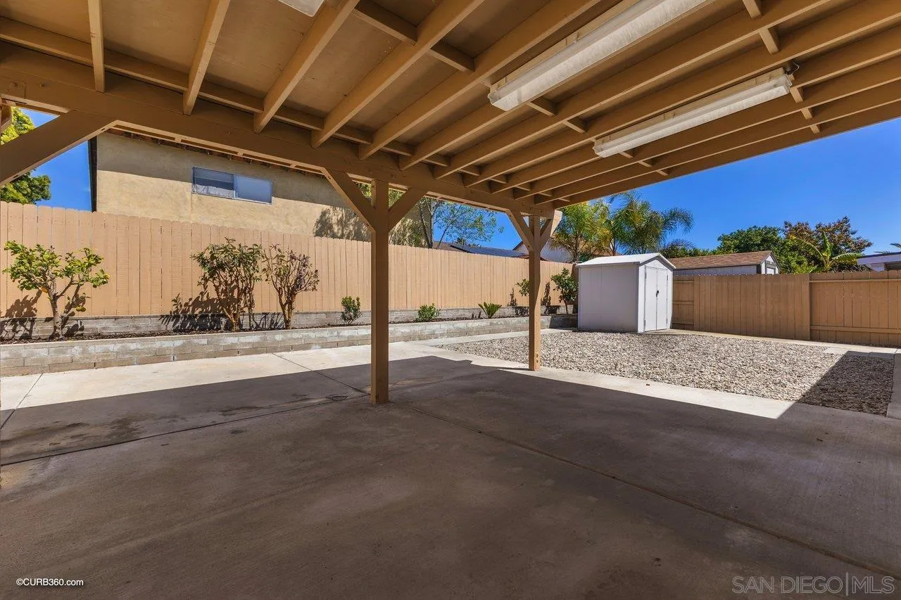 11129 Sagittarius Road San Diego, CA 92126 - Photo 3 of 8 a view of a backyard of a house