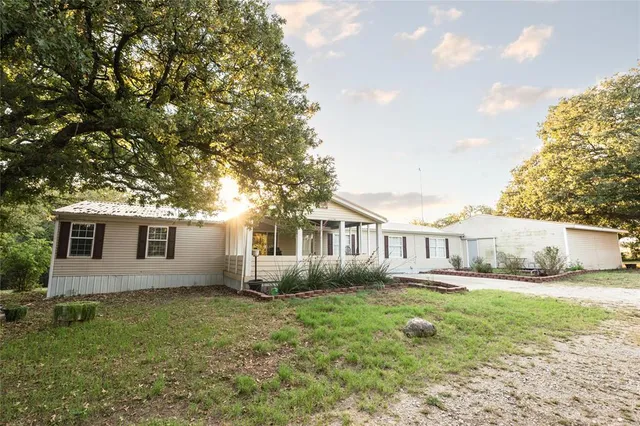 a house view with a garden space