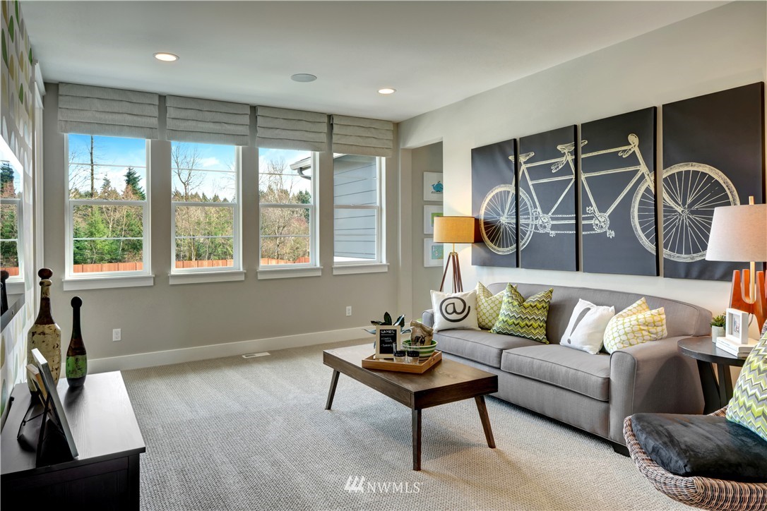 258 Field Place Southeast Renton, WA 98059 - Photo 15 of 19 a living room with furniture and a window