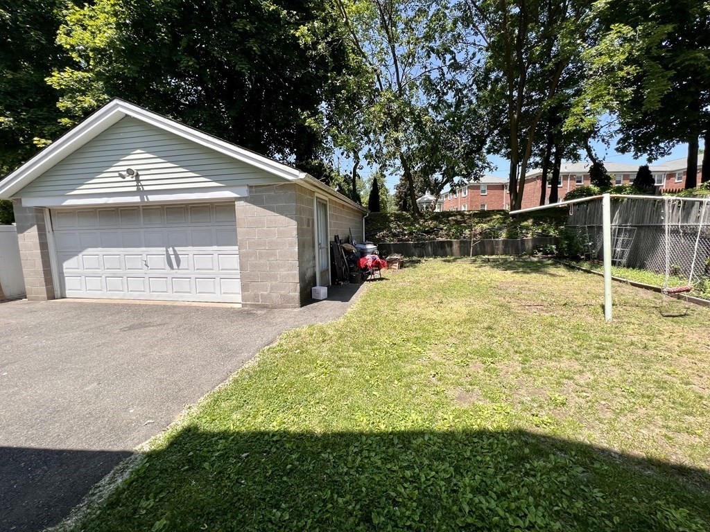 23 Webster Avenue West Springfield, MA 01089 - Photo 11 of 13 a front view of a house with a yard