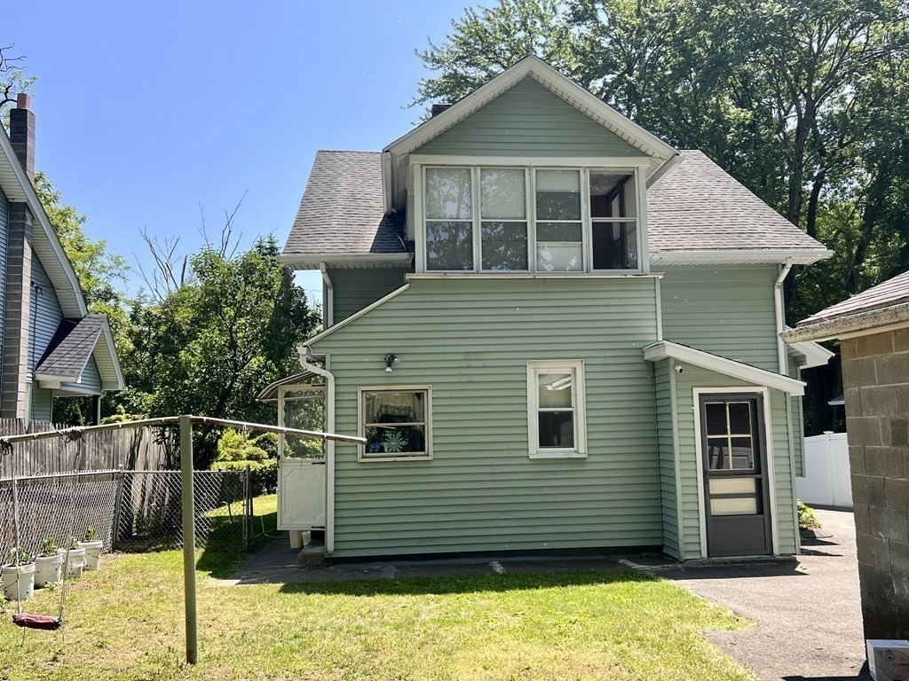 23 Webster Avenue West Springfield, MA 01089 - Photo 12 of 13 a front view of a house with a yard