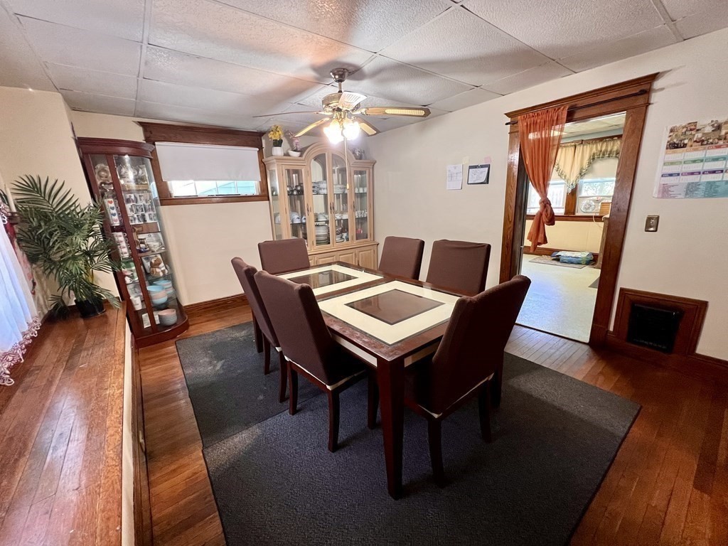 23 Webster Avenue West Springfield, MA 01089 - Photo 4 of 13 a view of a dining room with furniture and wooden floor