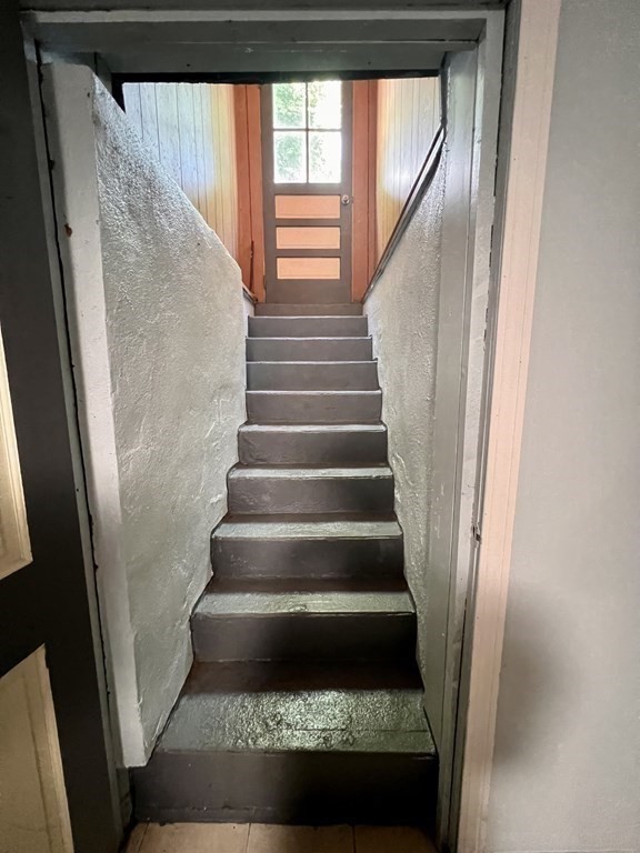 23 Webster Avenue West Springfield, MA 01089 - Photo 10 of 13 a view of staircase with wooden floor and white walls