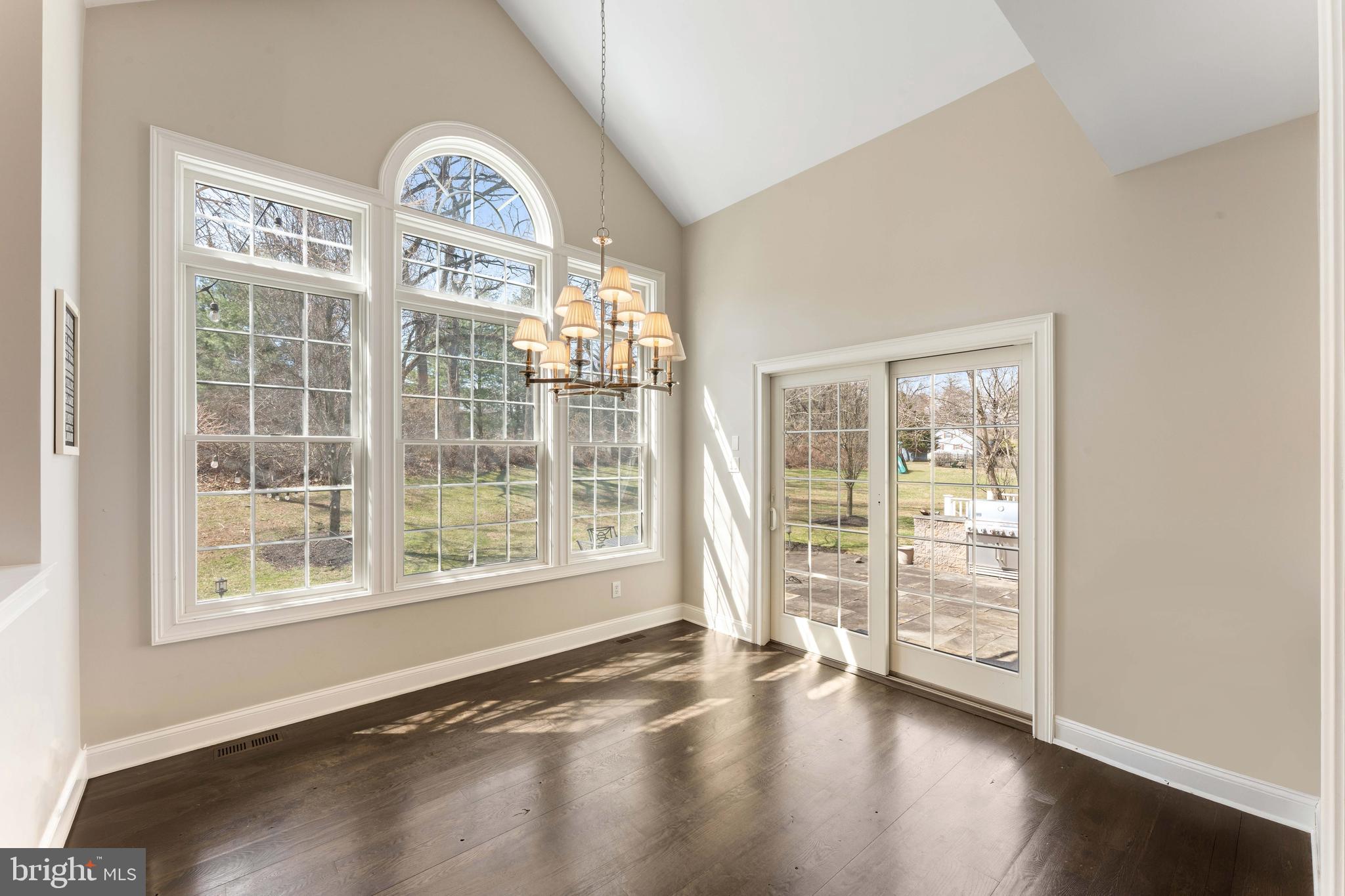 8 Quartermaster Road Feasterville-Trevose, PA 19053 - Photo 14 of 60 an empty room with wooden floor and a large window