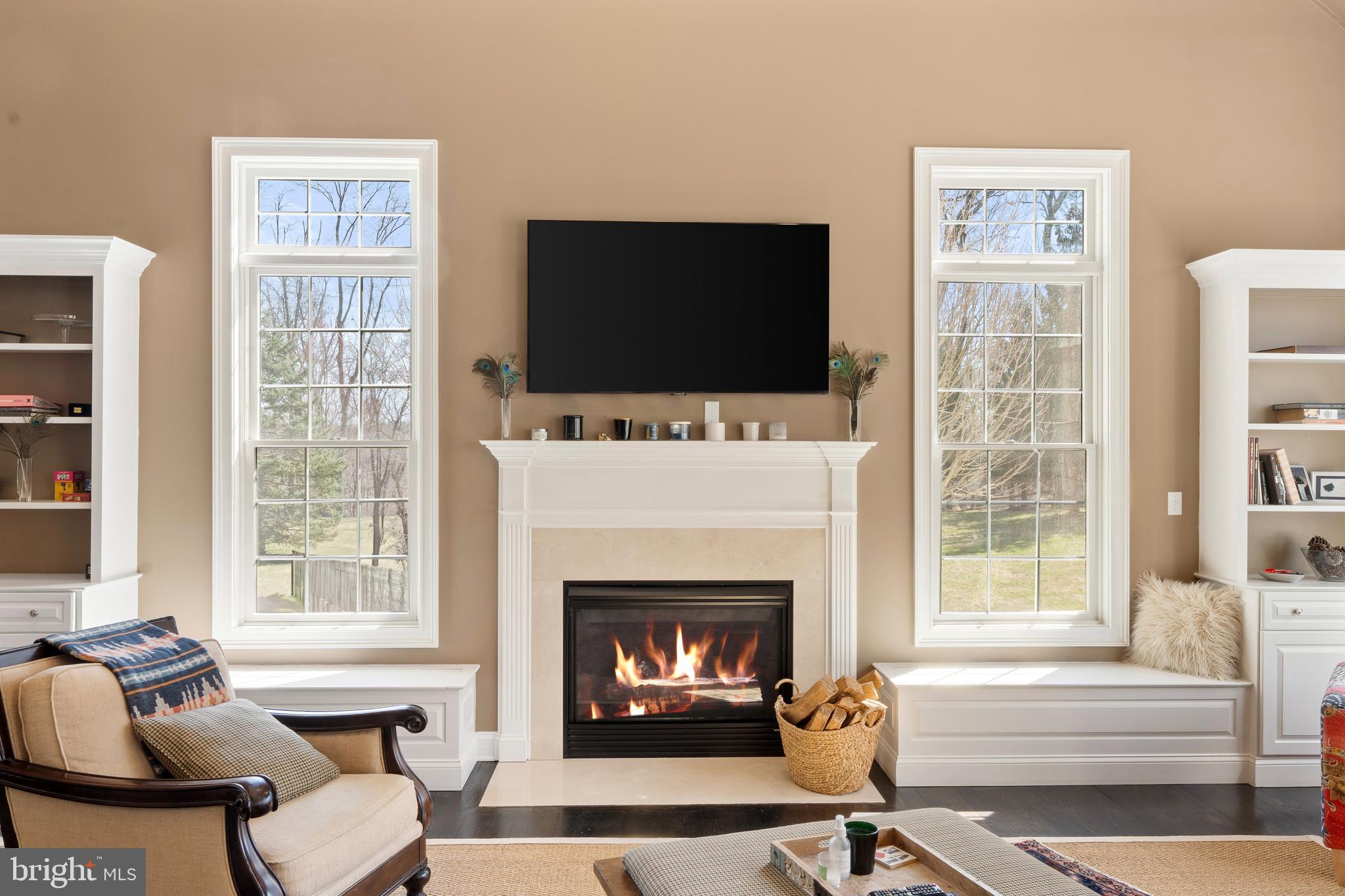 8 Quartermaster Road Feasterville-Trevose, PA 19053 - Photo 18 of 60 a living room with furniture a flat screen tv and a fireplace