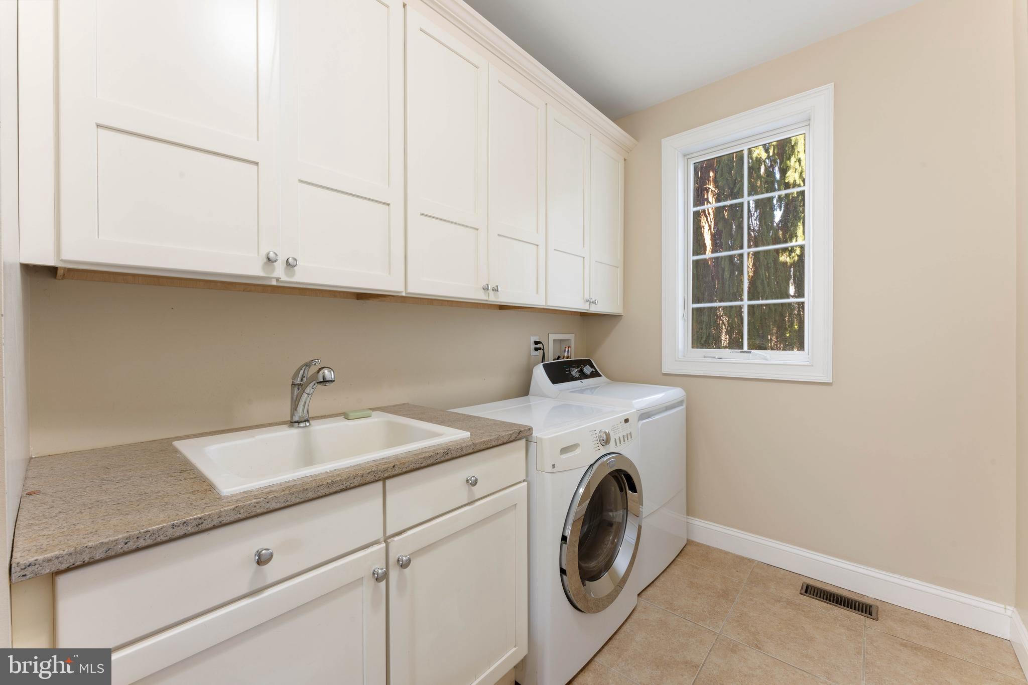 8 Quartermaster Road Feasterville-Trevose, PA 19053 - Photo 24 of 60 a utility room with dryer and washer