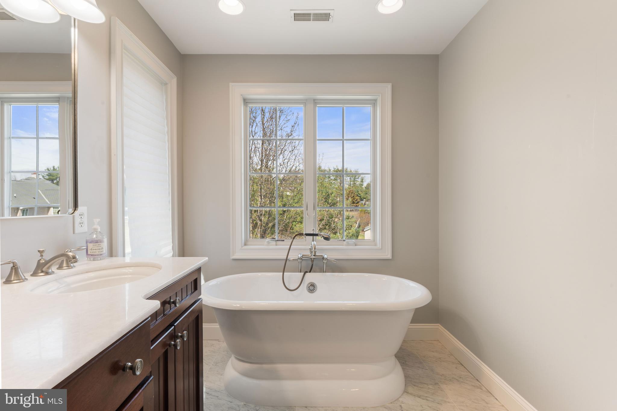 8 Quartermaster Road Feasterville-Trevose, PA 19053 - Photo 31 of 60 a bathroom with a sink and a window