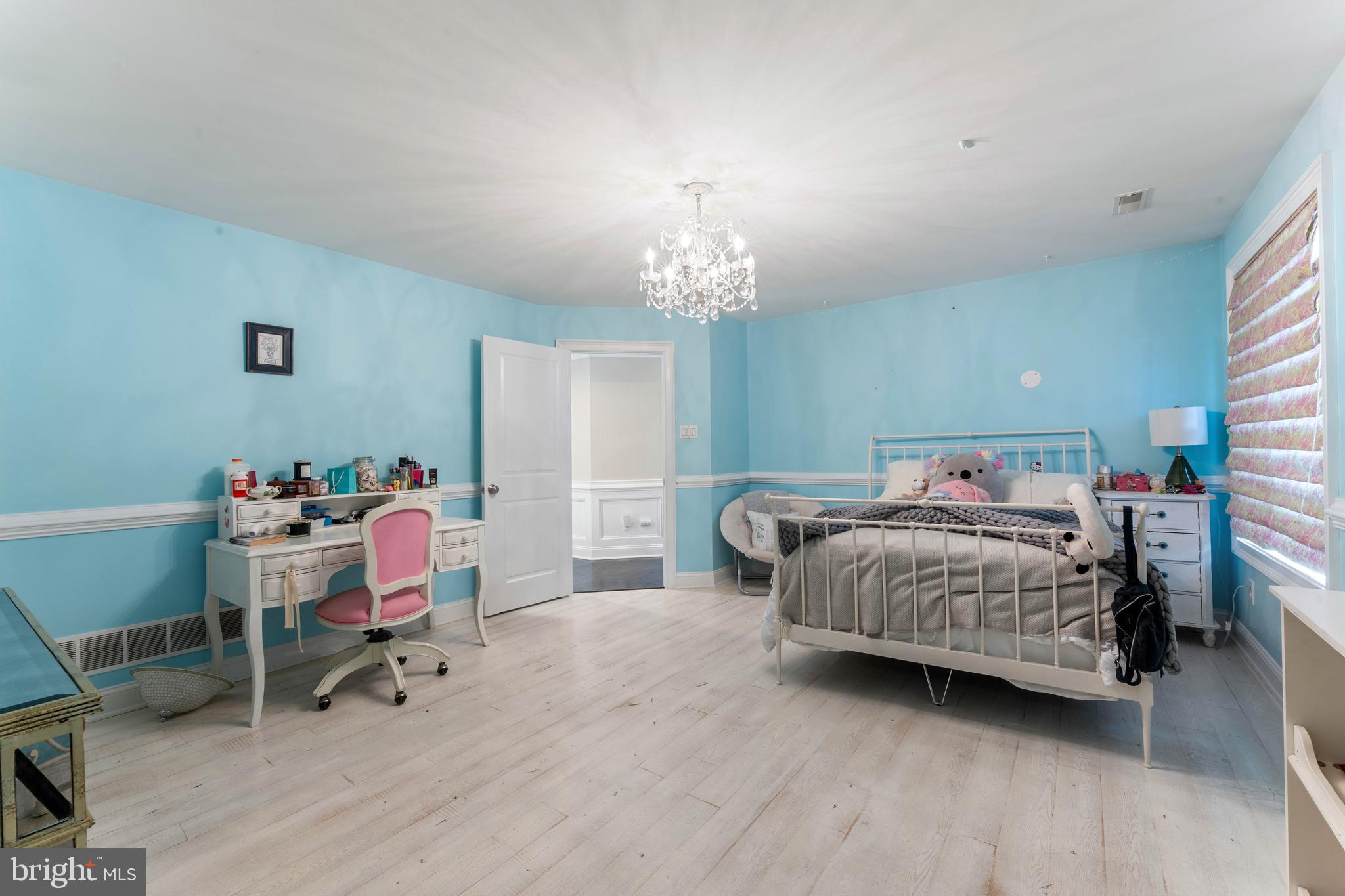 8 Quartermaster Road Feasterville-Trevose, PA 19053 - Photo 35 of 60 a bedroom with a bed a table and a chandelier