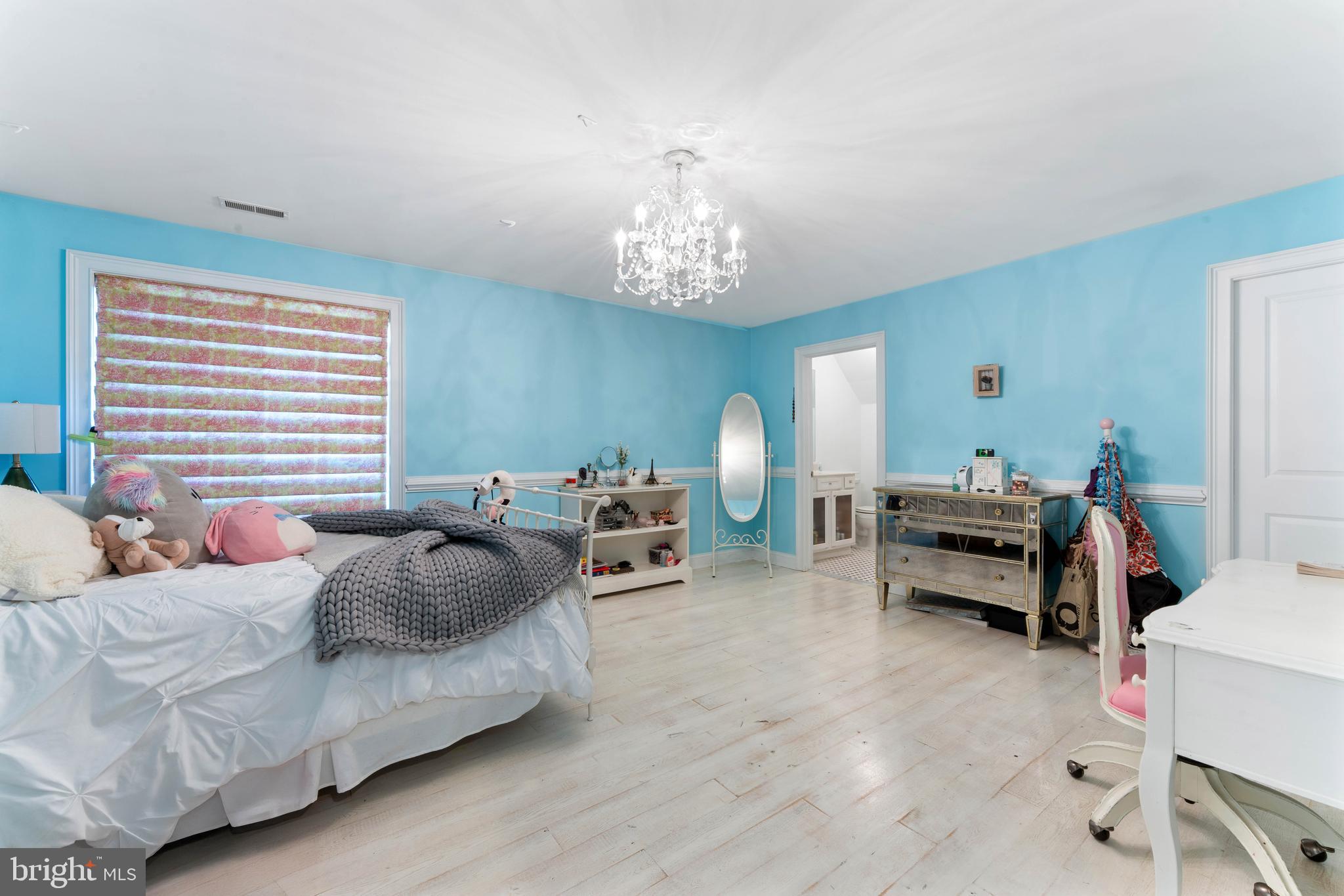 8 Quartermaster Road Feasterville-Trevose, PA 19053 - Photo 36 of 60 a bedroom with bed and a chandelier