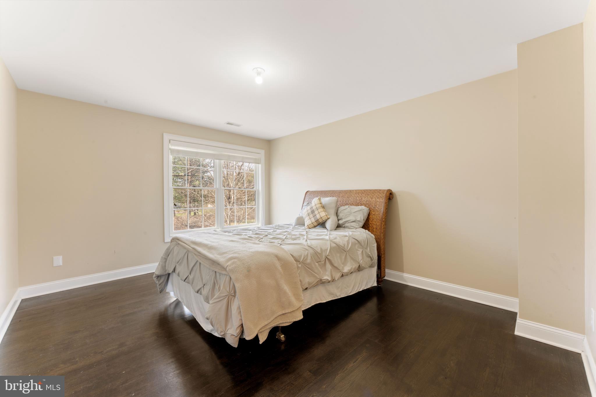 8 Quartermaster Road Feasterville-Trevose, PA 19053 - Photo 41 of 60 a bedroom with a bed and window