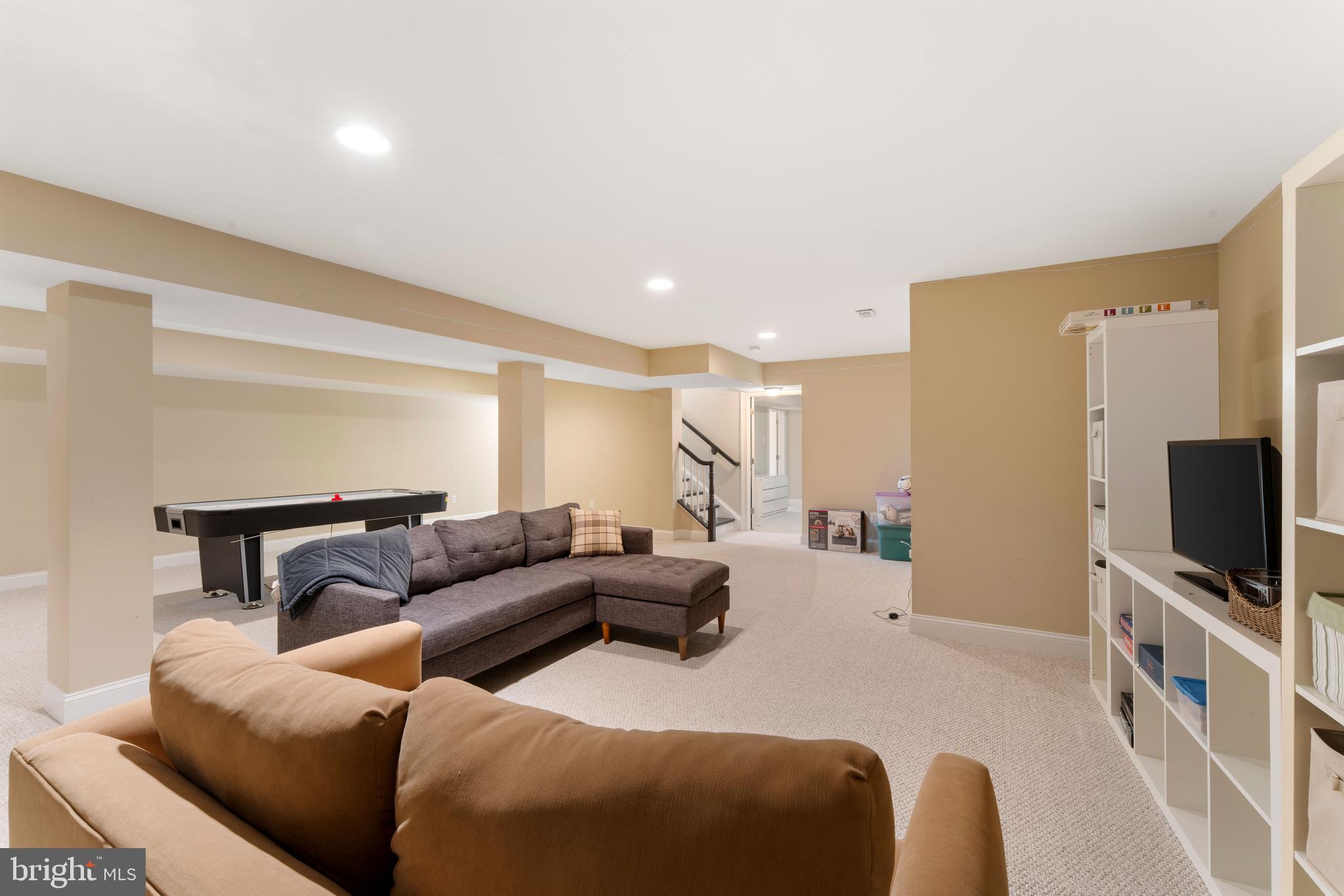 8 Quartermaster Road Feasterville-Trevose, PA 19053 - Photo 46 of 60 a living room with furniture and a flat screen tv
