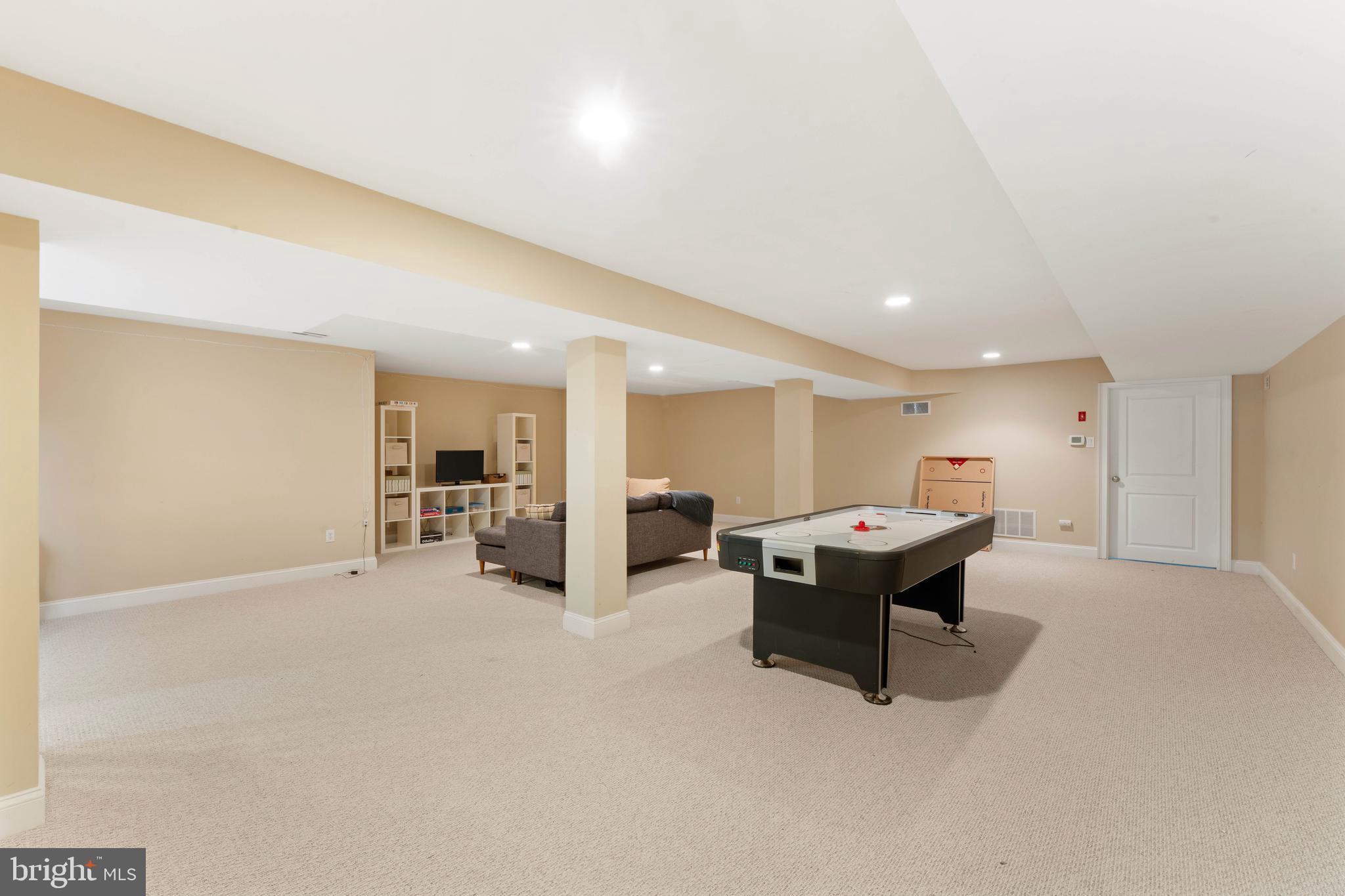 8 Quartermaster Road Feasterville-Trevose, PA 19053 - Photo 47 of 60 a living room with furniture and kitchen view
