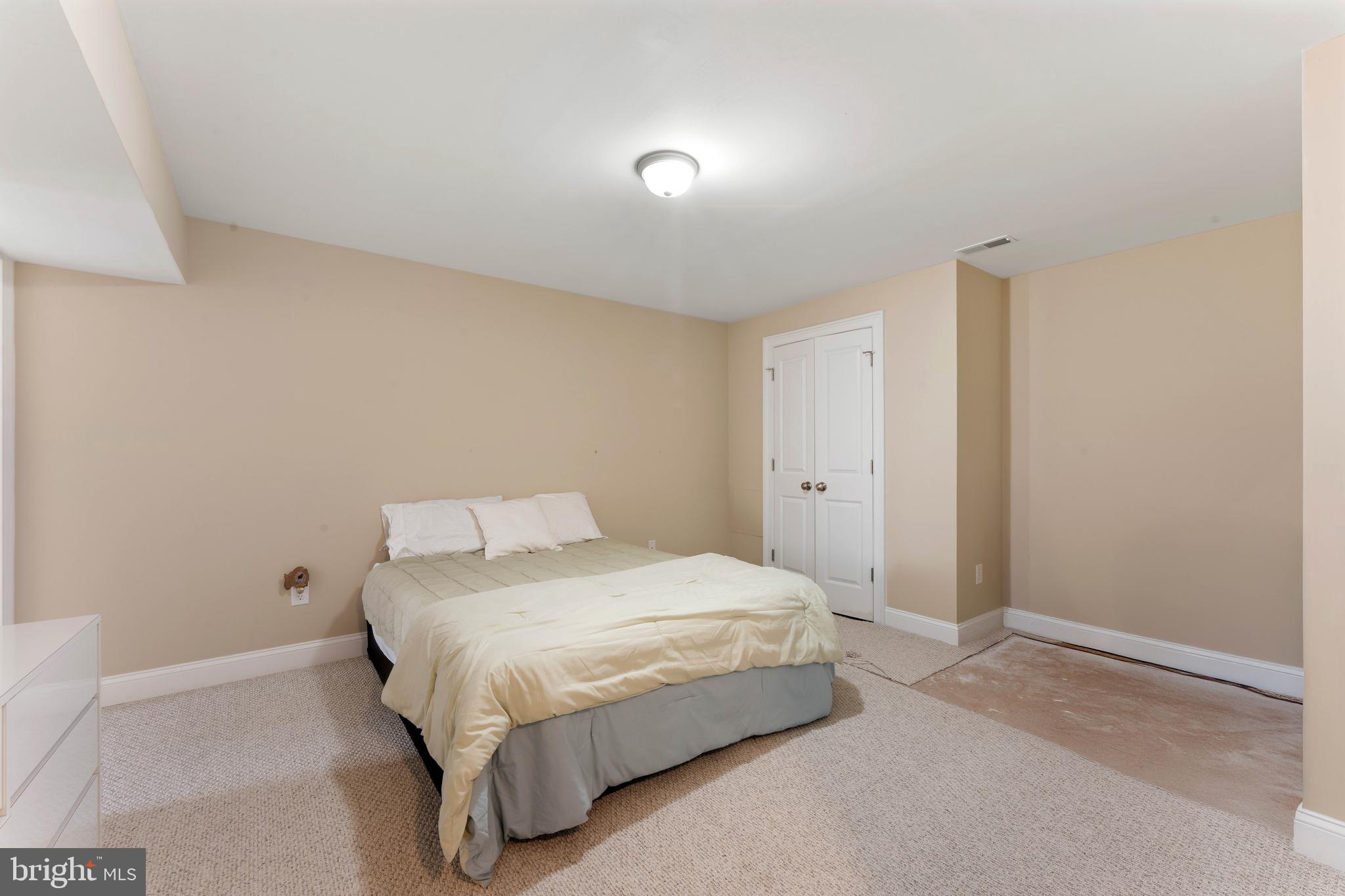 8 Quartermaster Road Feasterville-Trevose, PA 19053 - Photo 49 of 60 a bedroom with a bed and a night stand